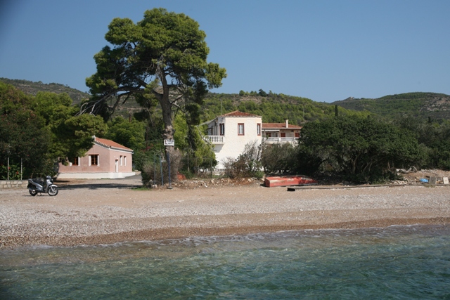 Spetses Island - Church of Ag. Anargyri on the beach alongside tavernas 